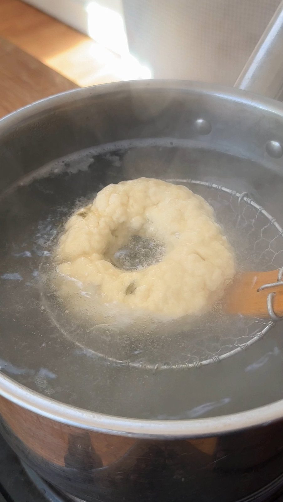 boiling bagels in water.