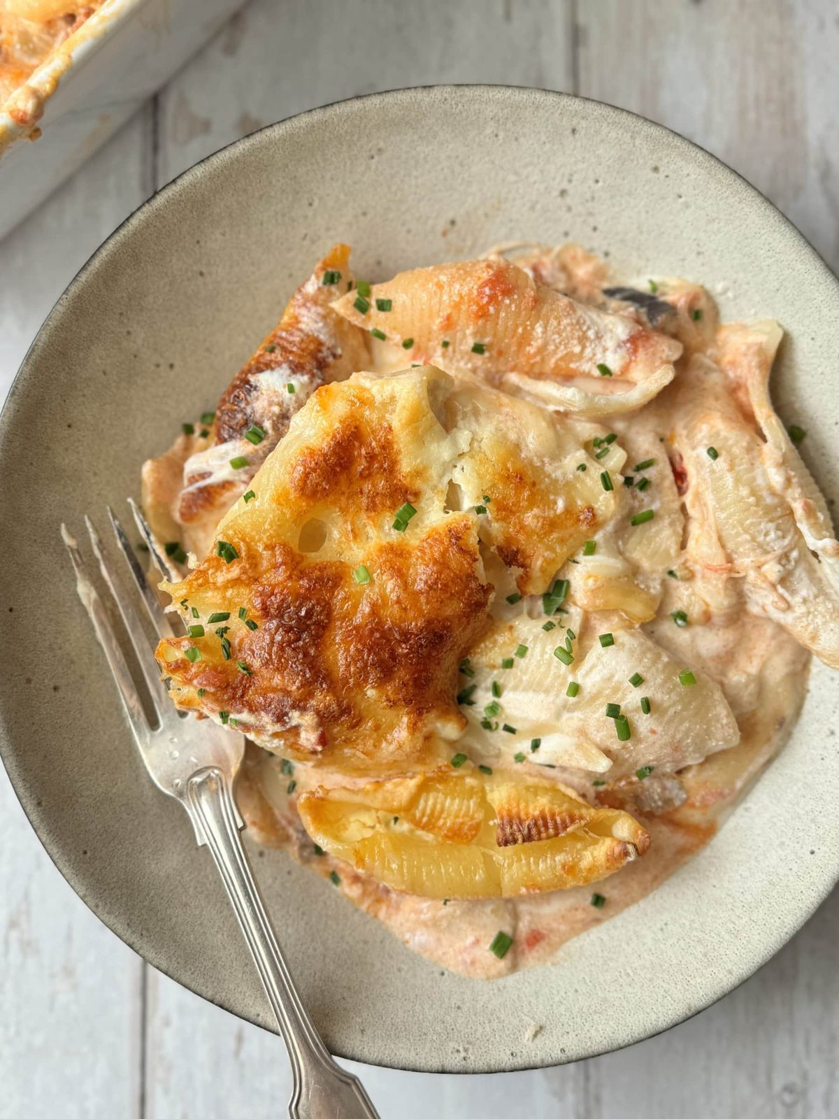 a bowl of ricotta and aubergine giant shell pasta.