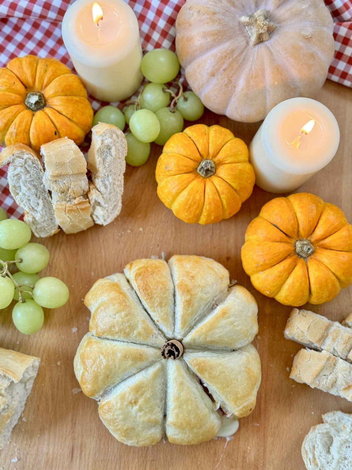 Baked Brie and Cranberry Puff Pastry shaped like a pumpkin.