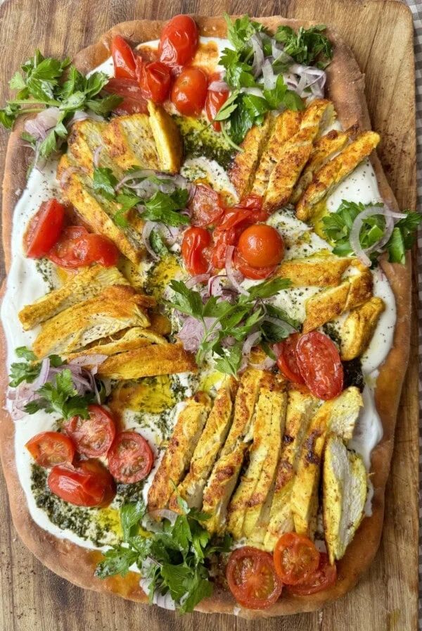 chicken flatbread on wooden board