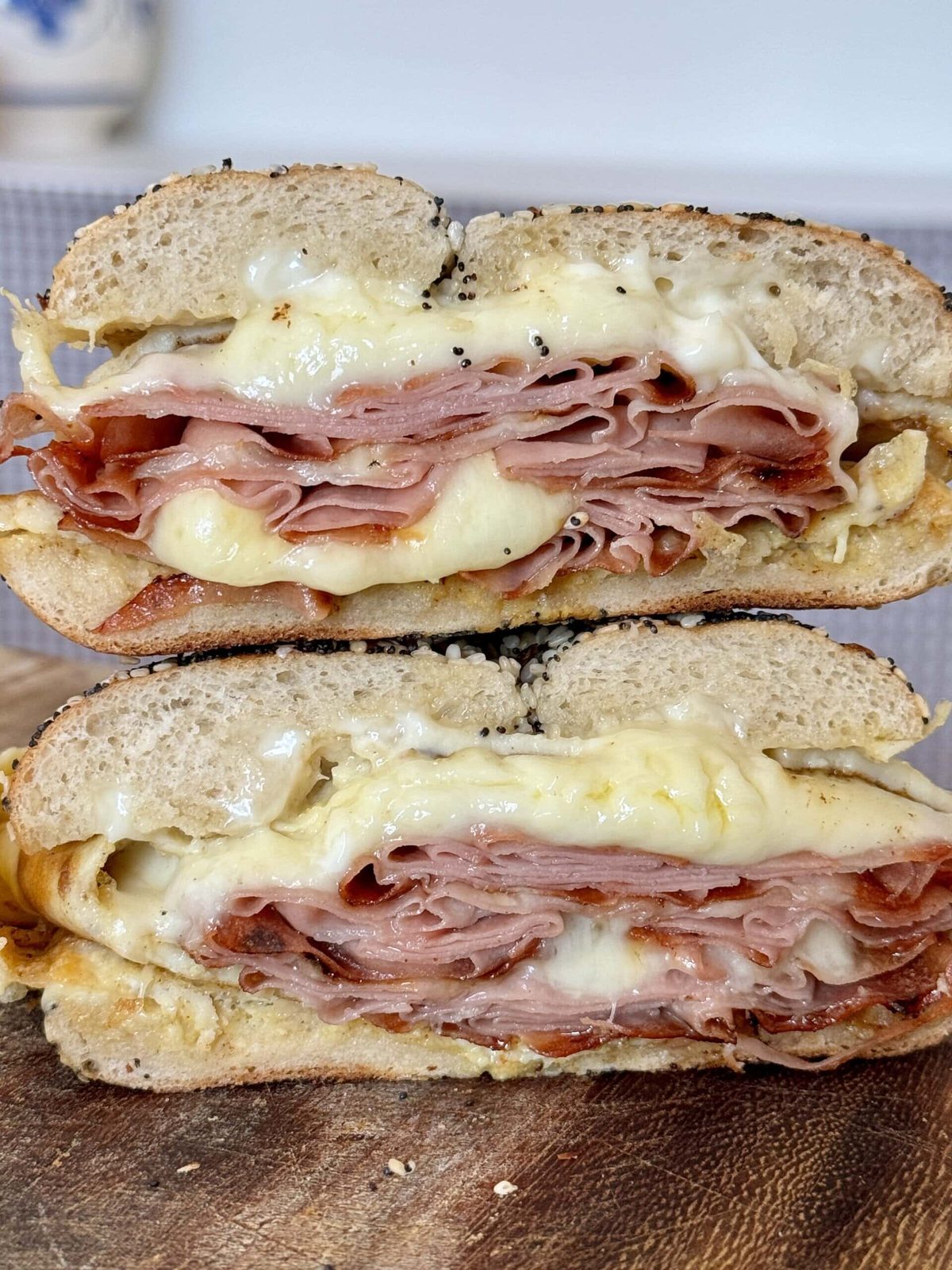 breakfast bagels sandwiches stacked up.