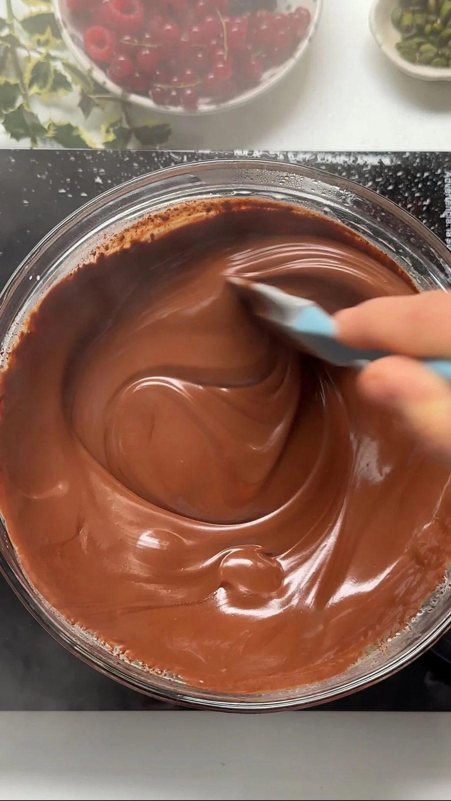Making chocolate ganache to decorate yule log.