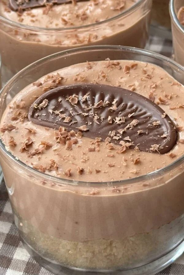 chocolate orange cheesecakes in small glass.