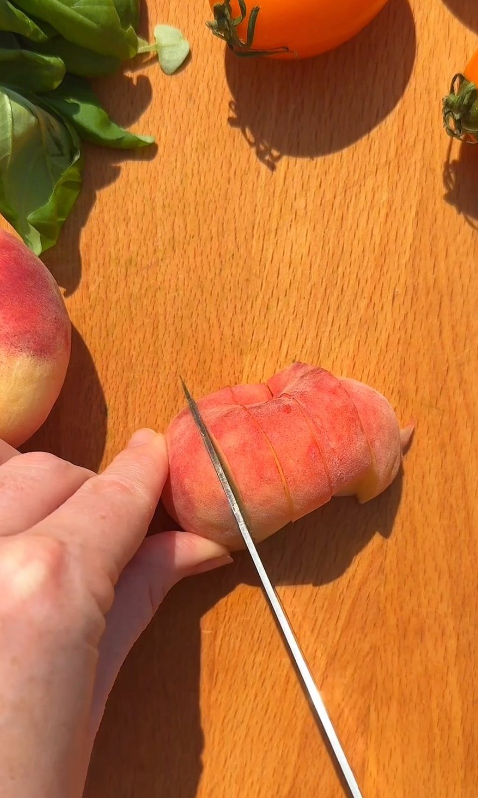 slicing a peach.