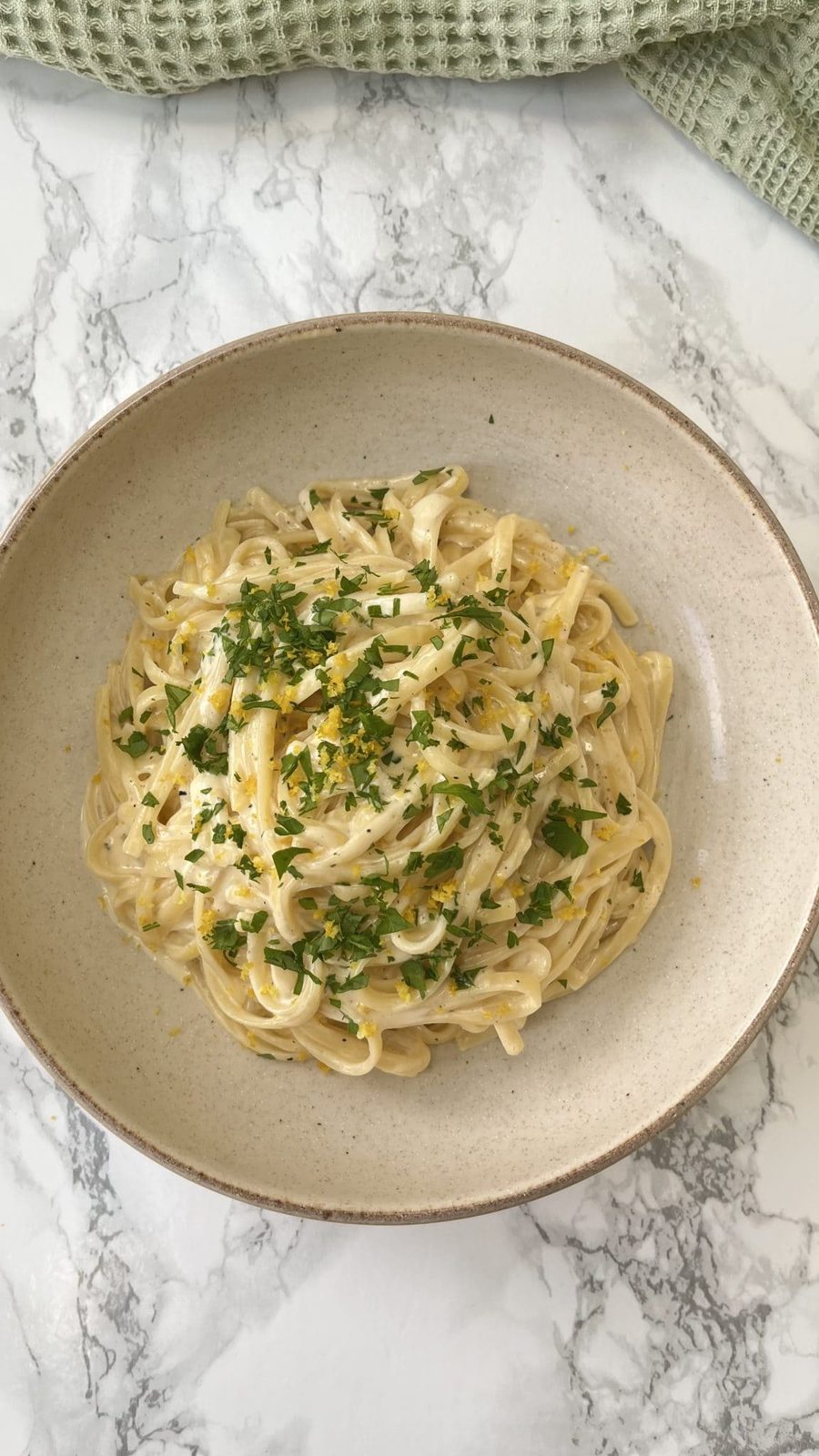 A bowl of buttery lemon pasta