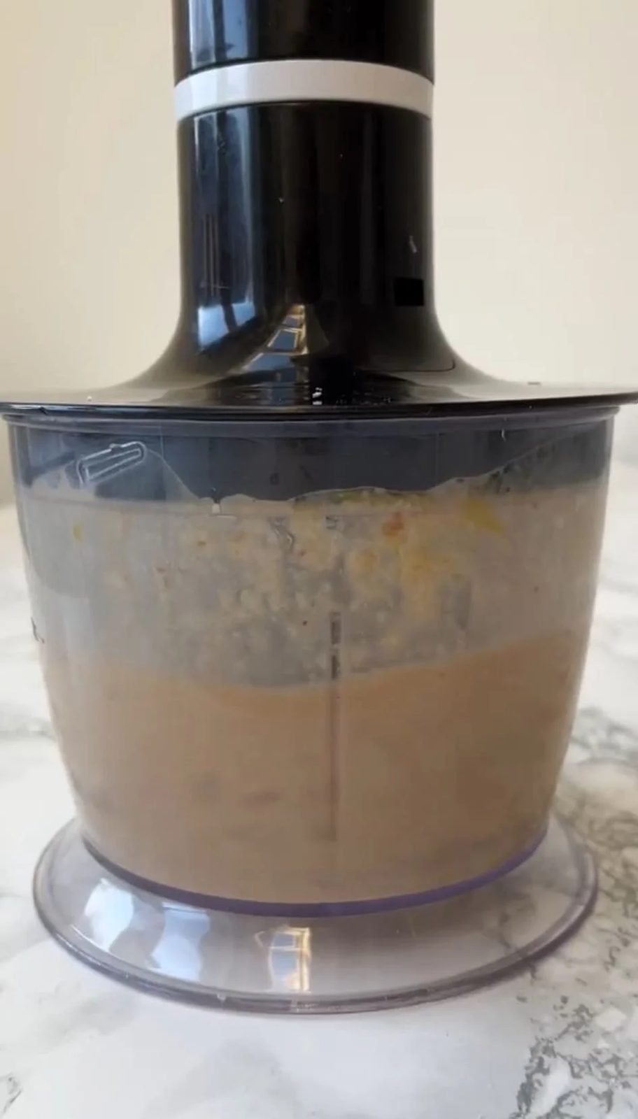 Blender full of creamy caesar salad dressing