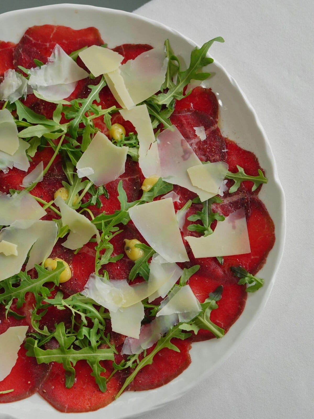 beef carpaccio with arugula and parmesan.
