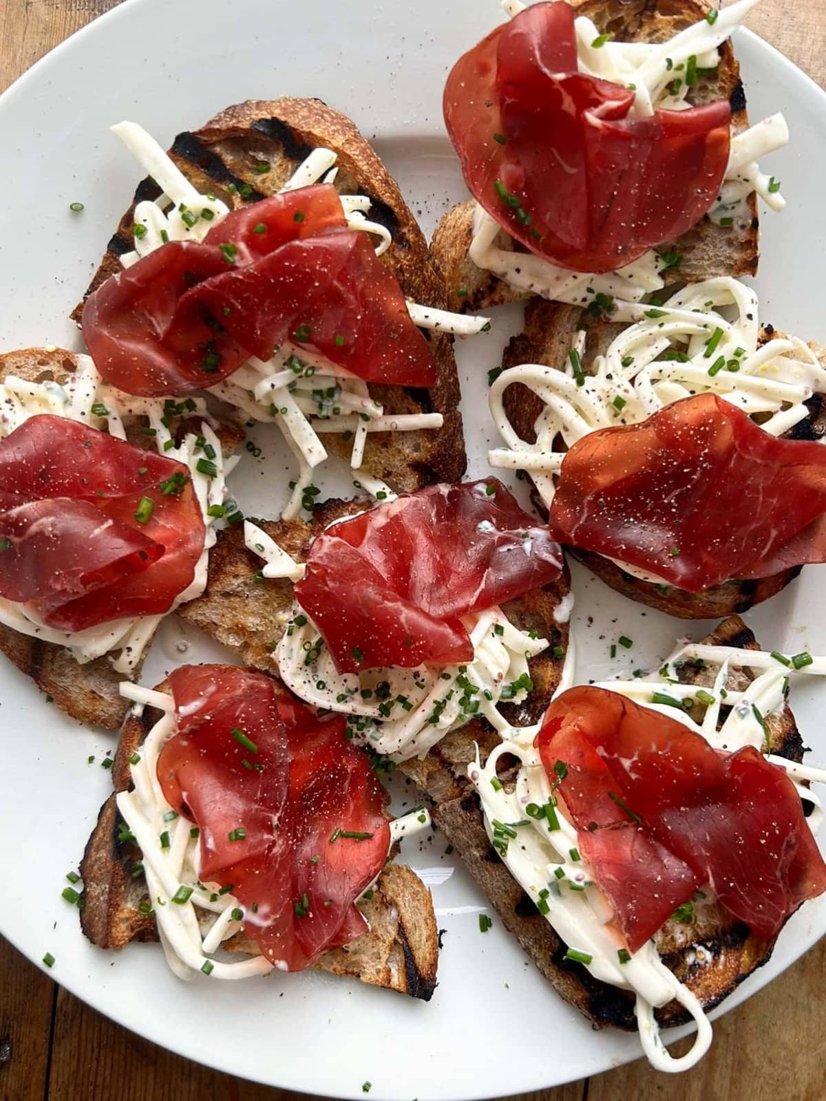 celeri remoulade on toast with bresaola on top.