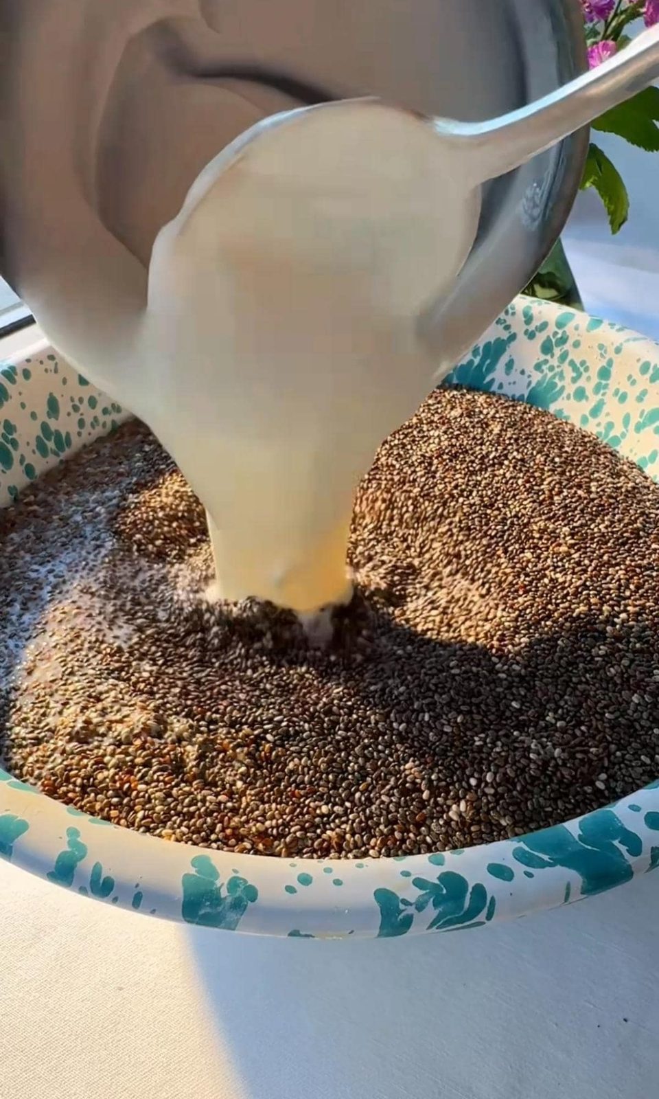 adding yogurt to chia pudding.