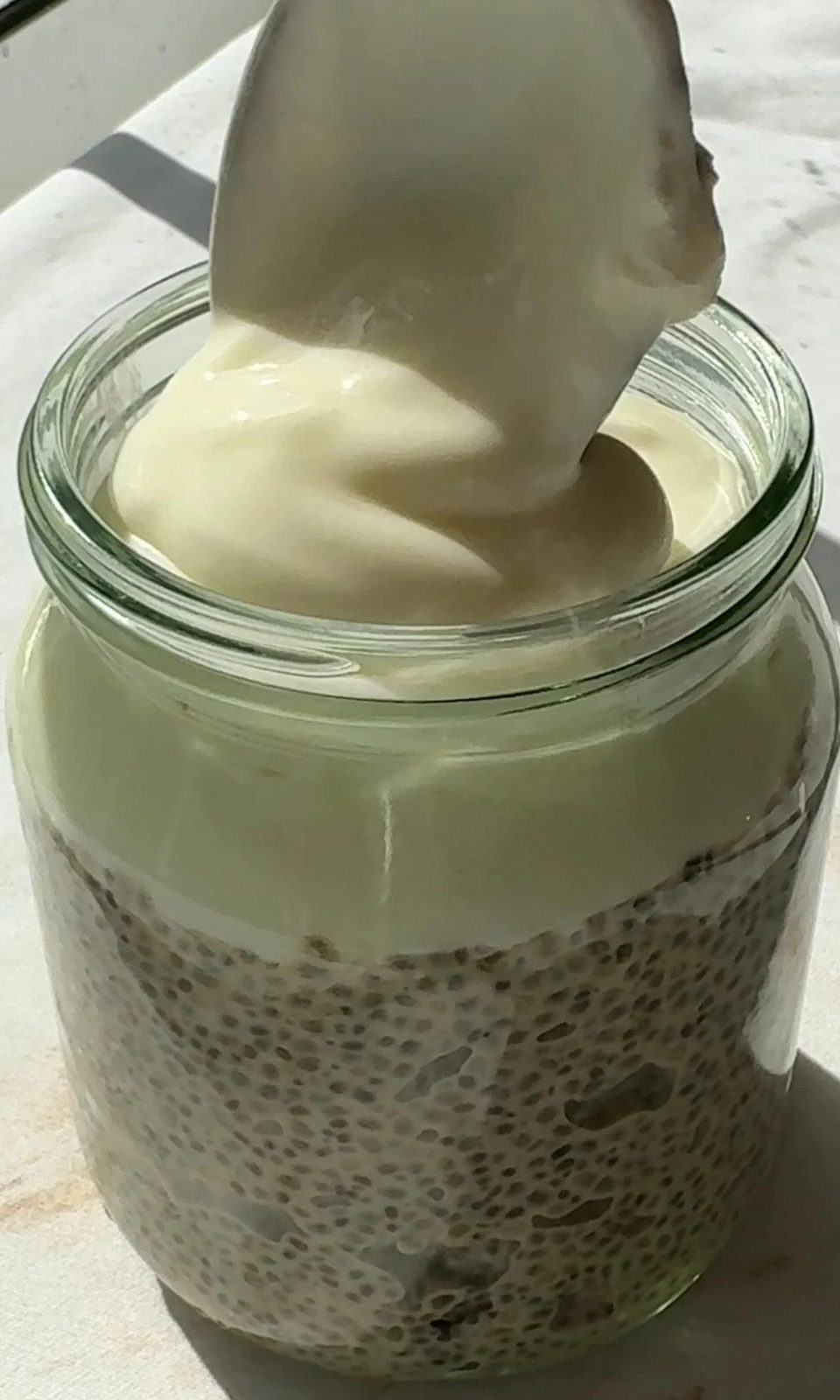 topping chia pudding with yogurt