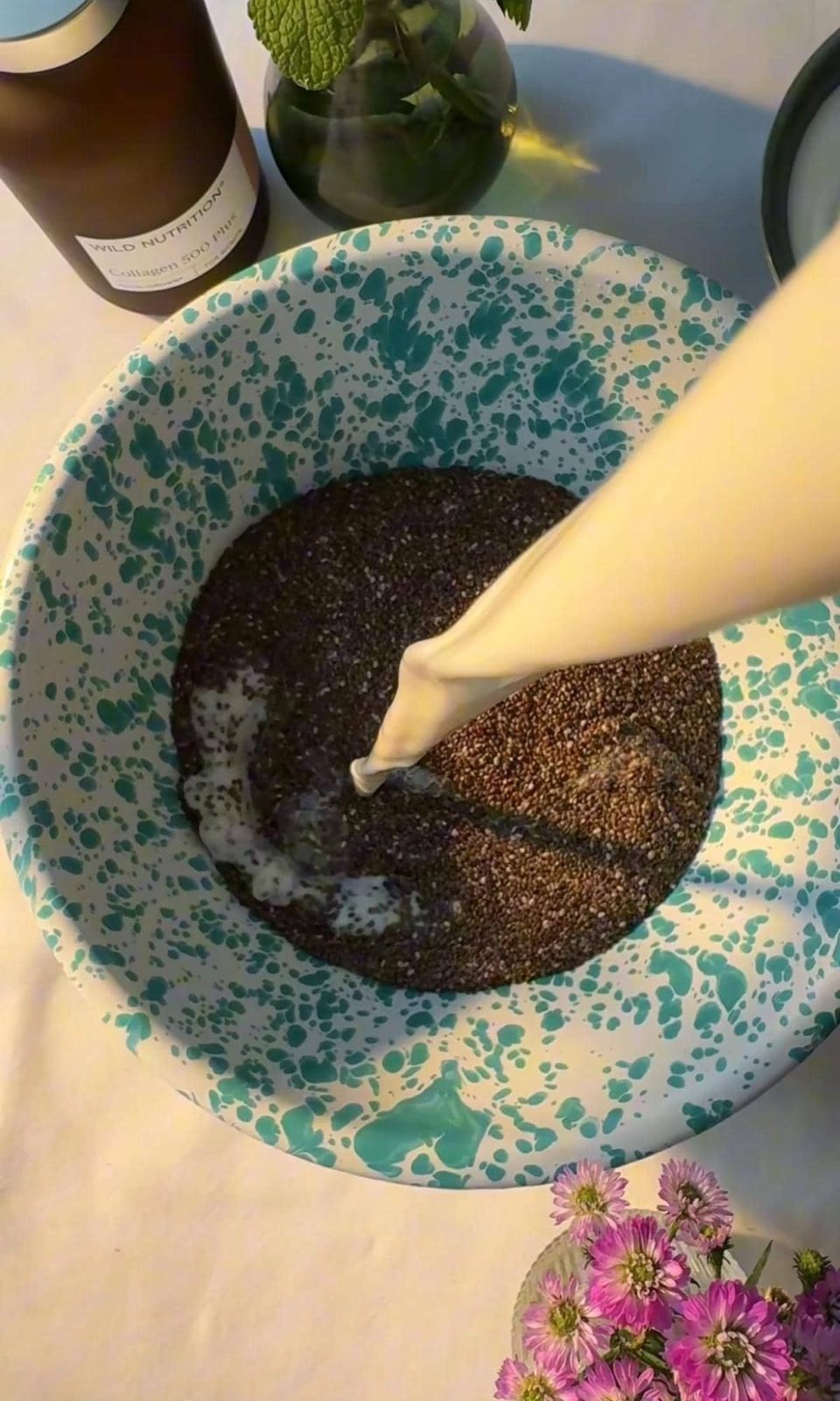 adding milk to chia seeds.