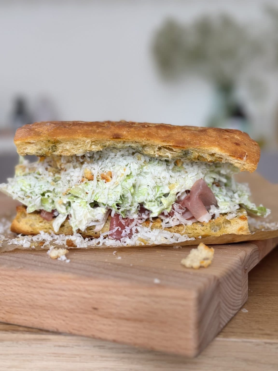 Side angle of a chicken caesar sandwich