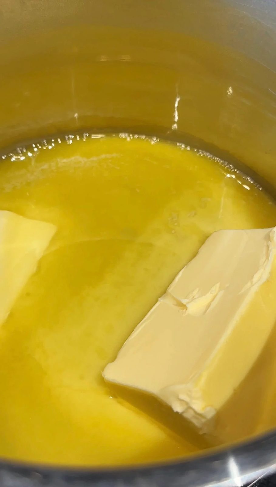 Butter melting in pan.