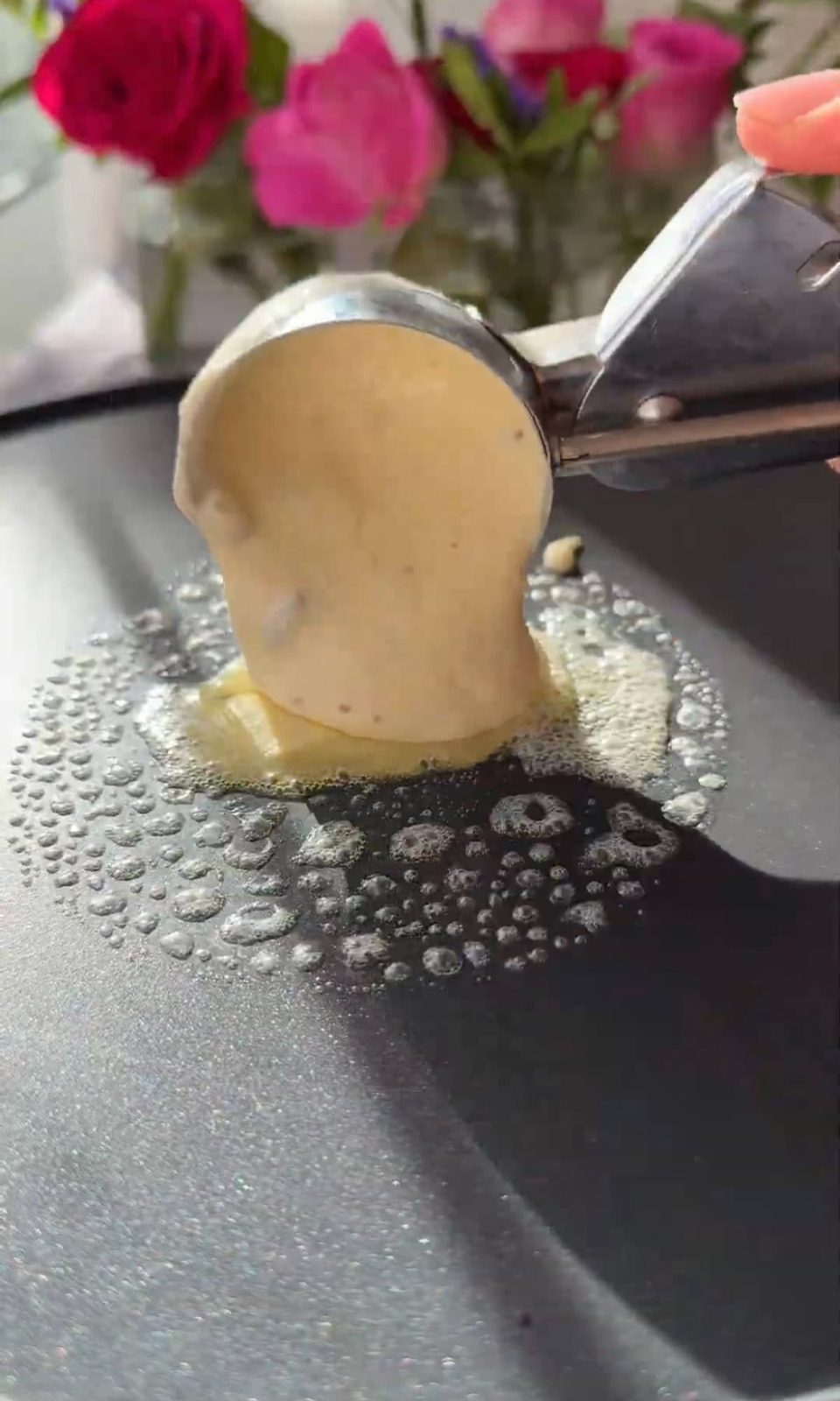 frying chocolate chip pancakes.