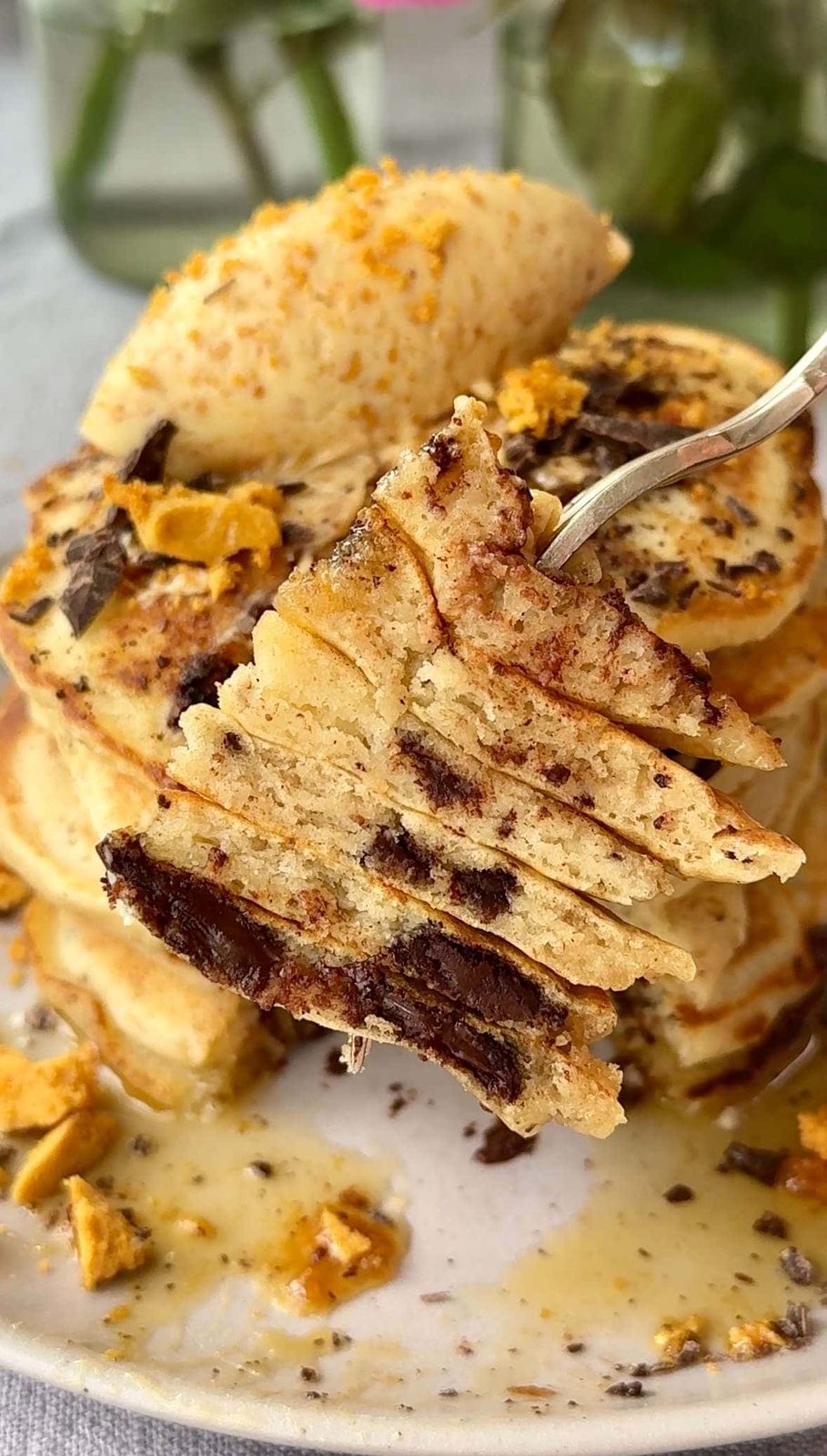 chocolate chip pancakes on a fork.