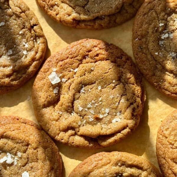 chocolate chipless cookies on baking parchment.