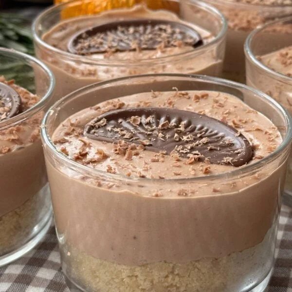 chocolate orange cheesecakes in small glass.