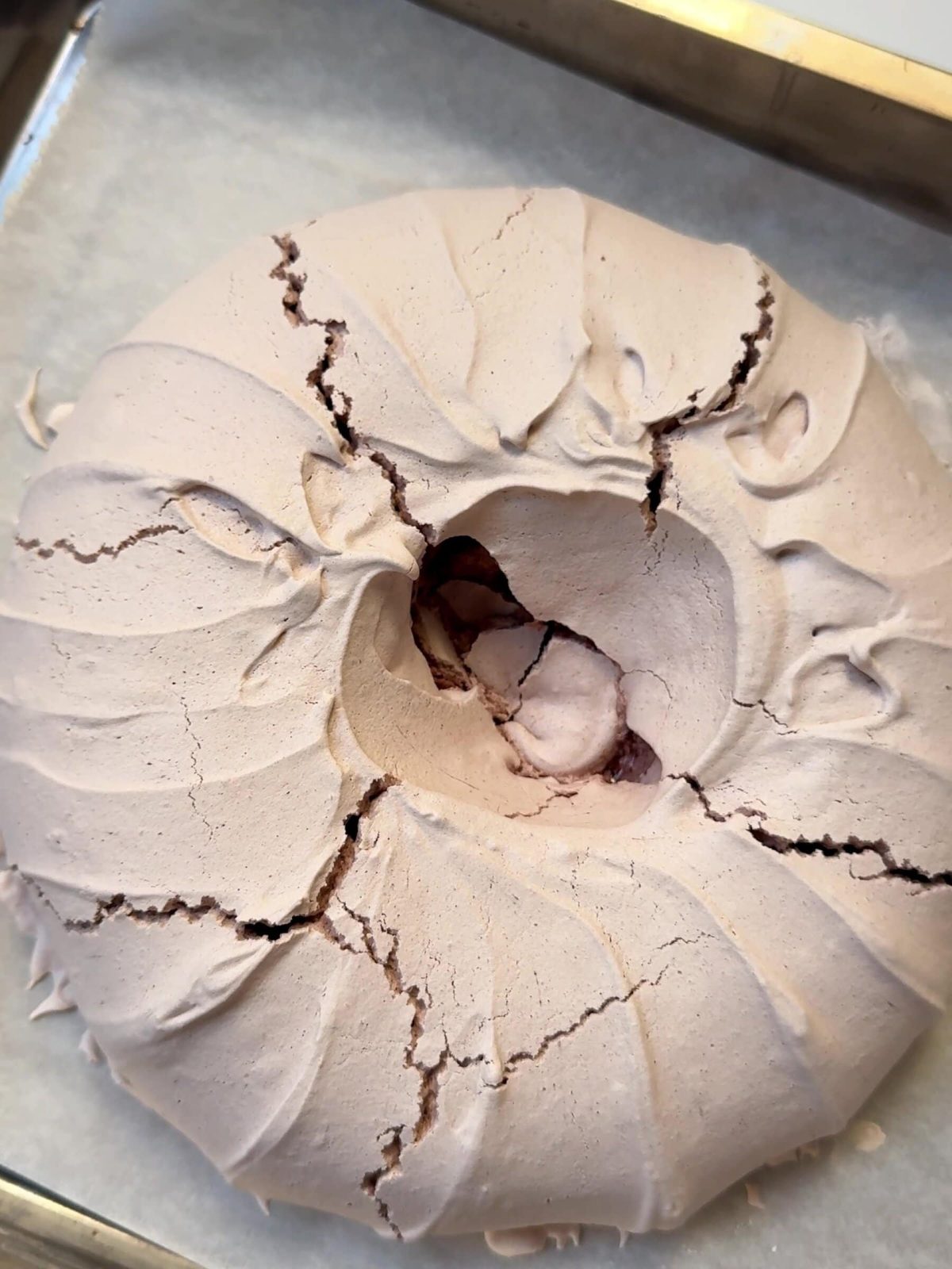 Cooling the Christmas Pavlova on a baking sheet.