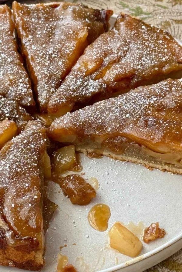 pear upside down cake on a plate.