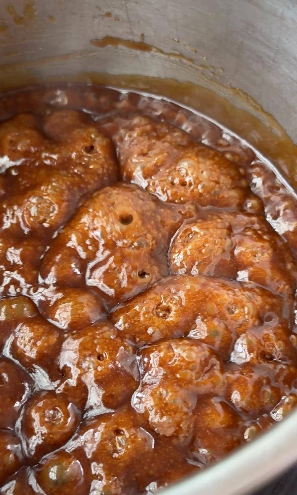 Bubbling toffee to the crack stage.
