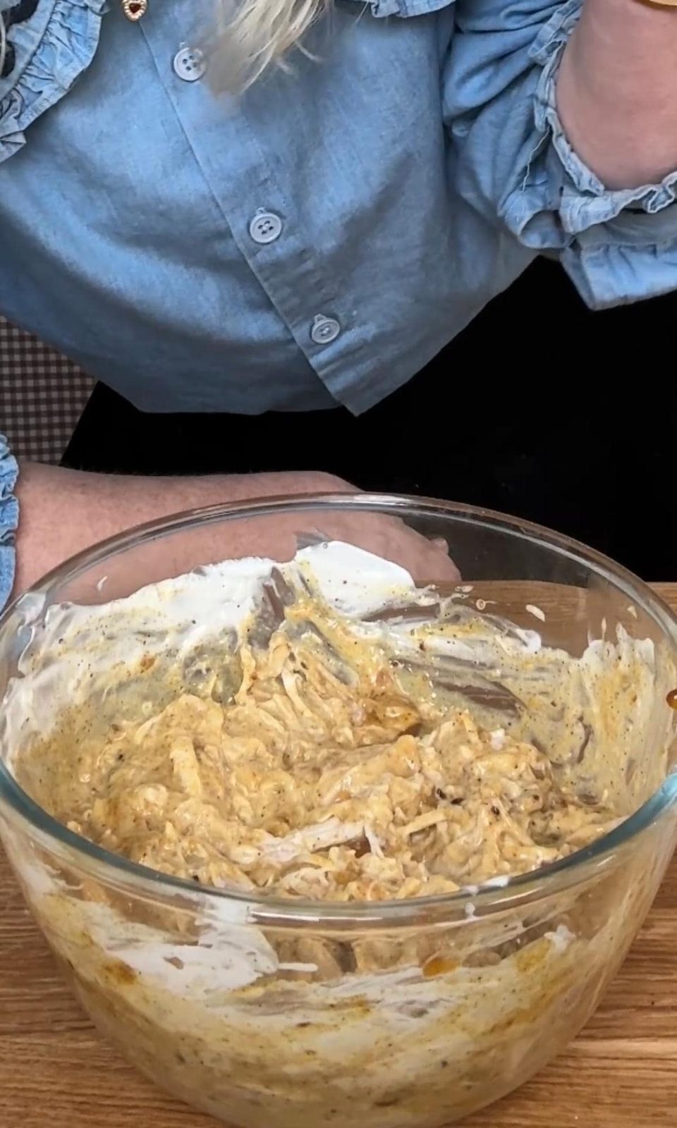 mixing coronation chicken.