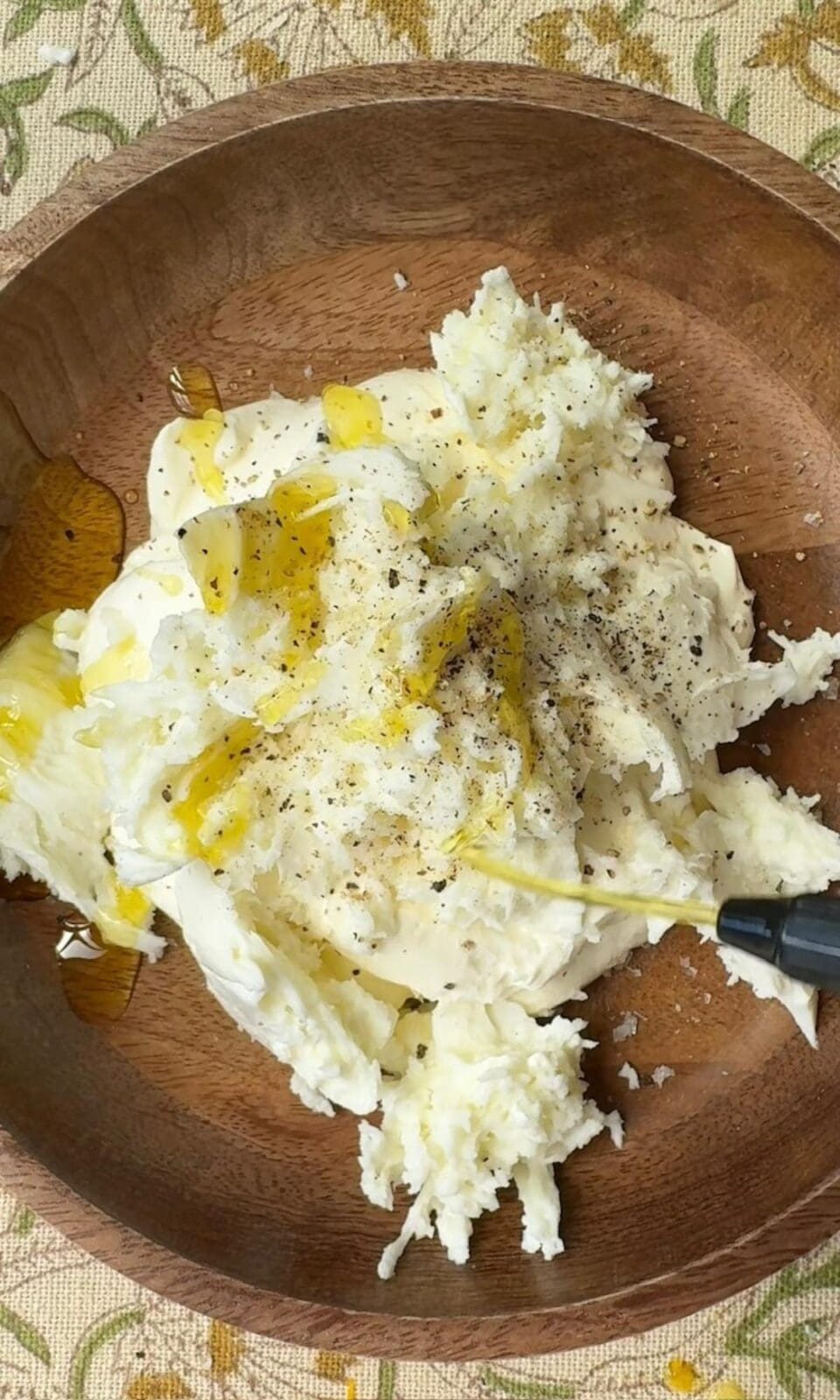 mixing creme fraiche and mozzarella.