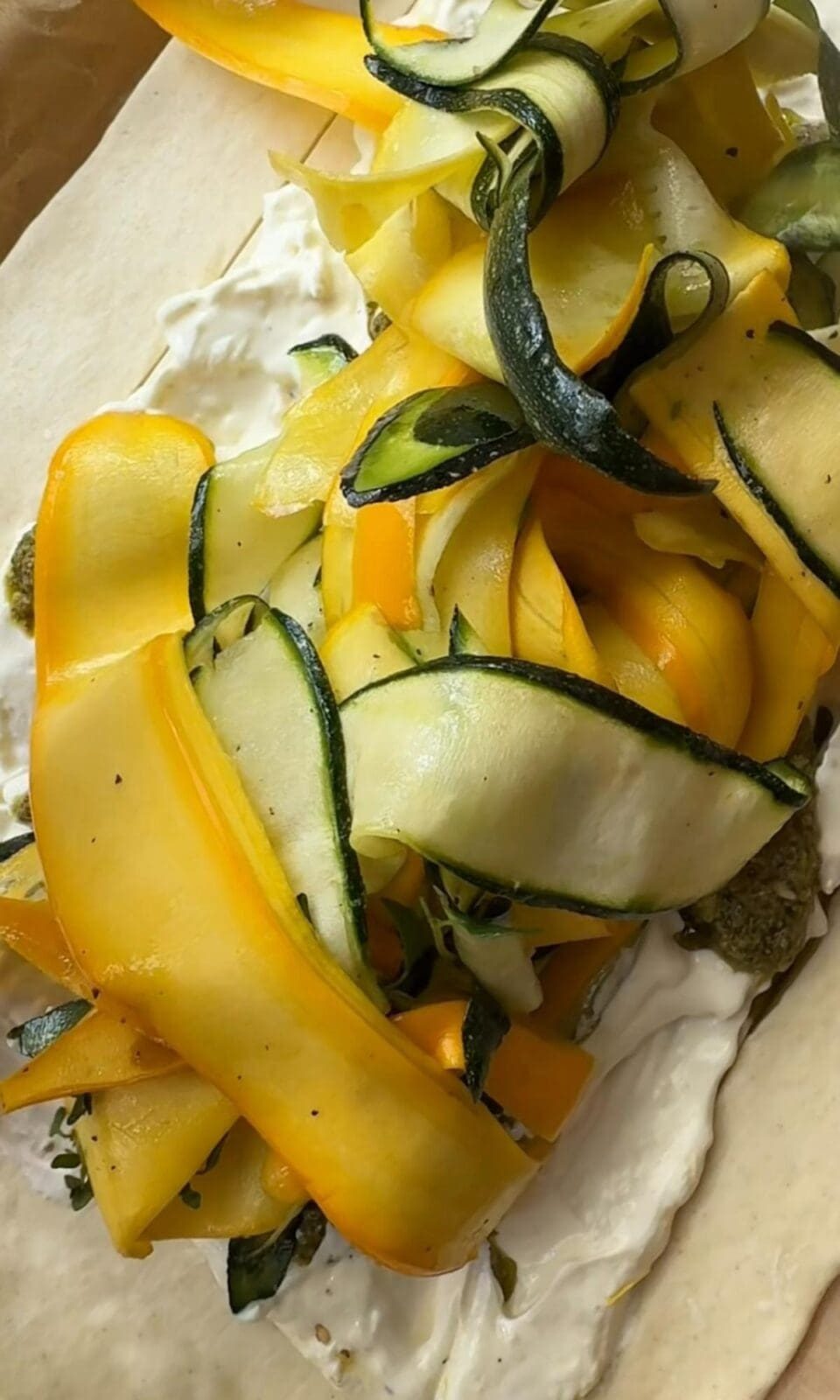 topping tart with courgettes.