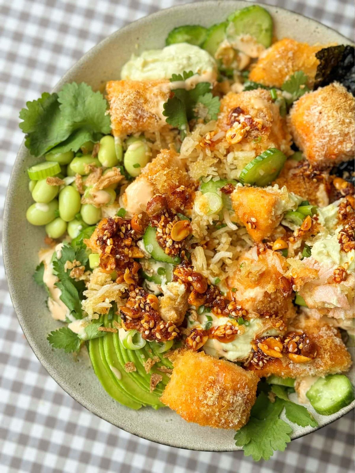 Crunchy Salmon Roll (in a bowl) with edamame and chilli oil.