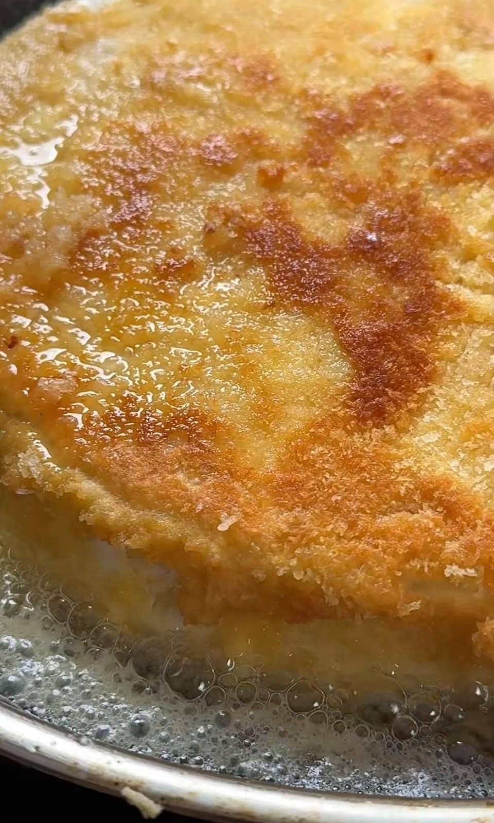 deep frying brie in a pan.