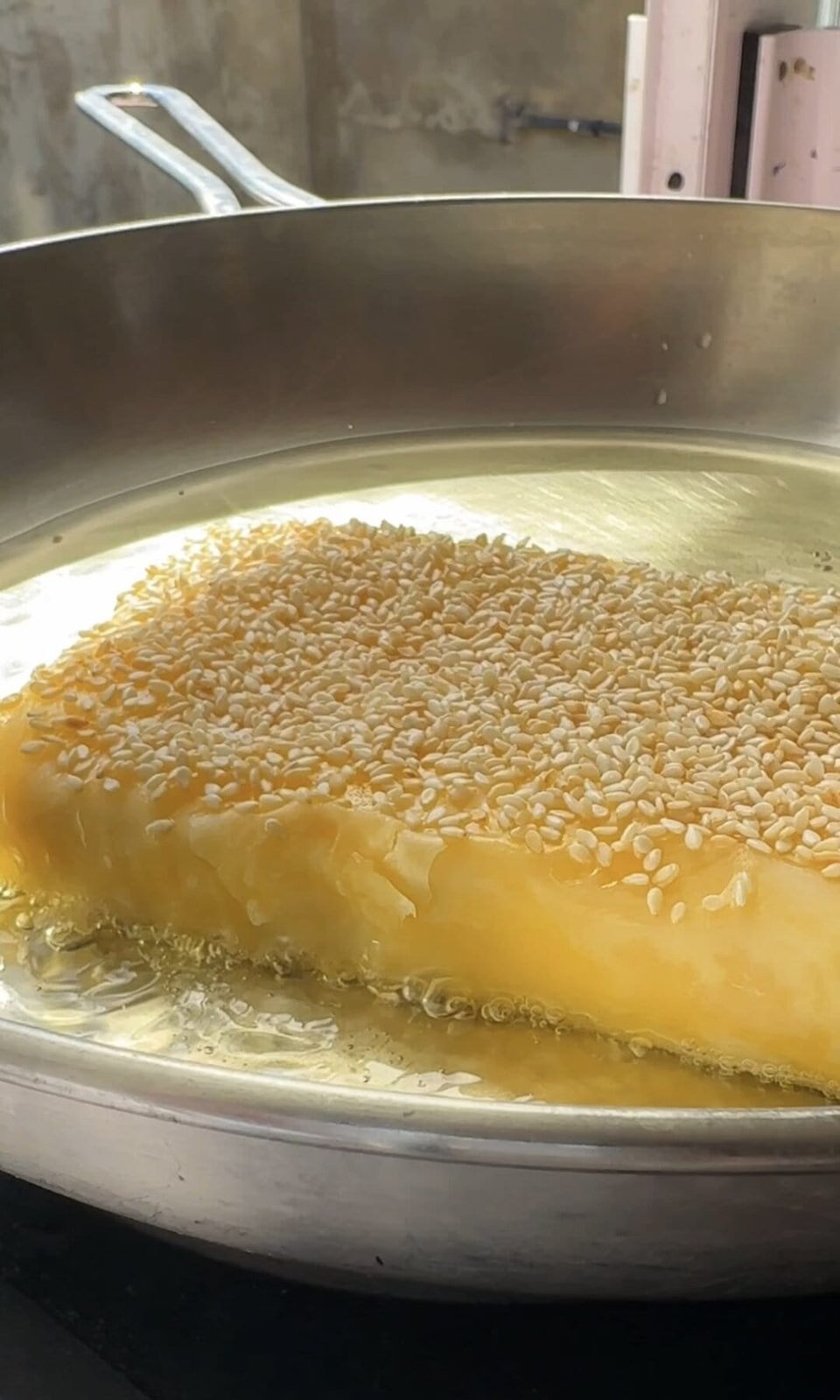 frying feta saganaki.