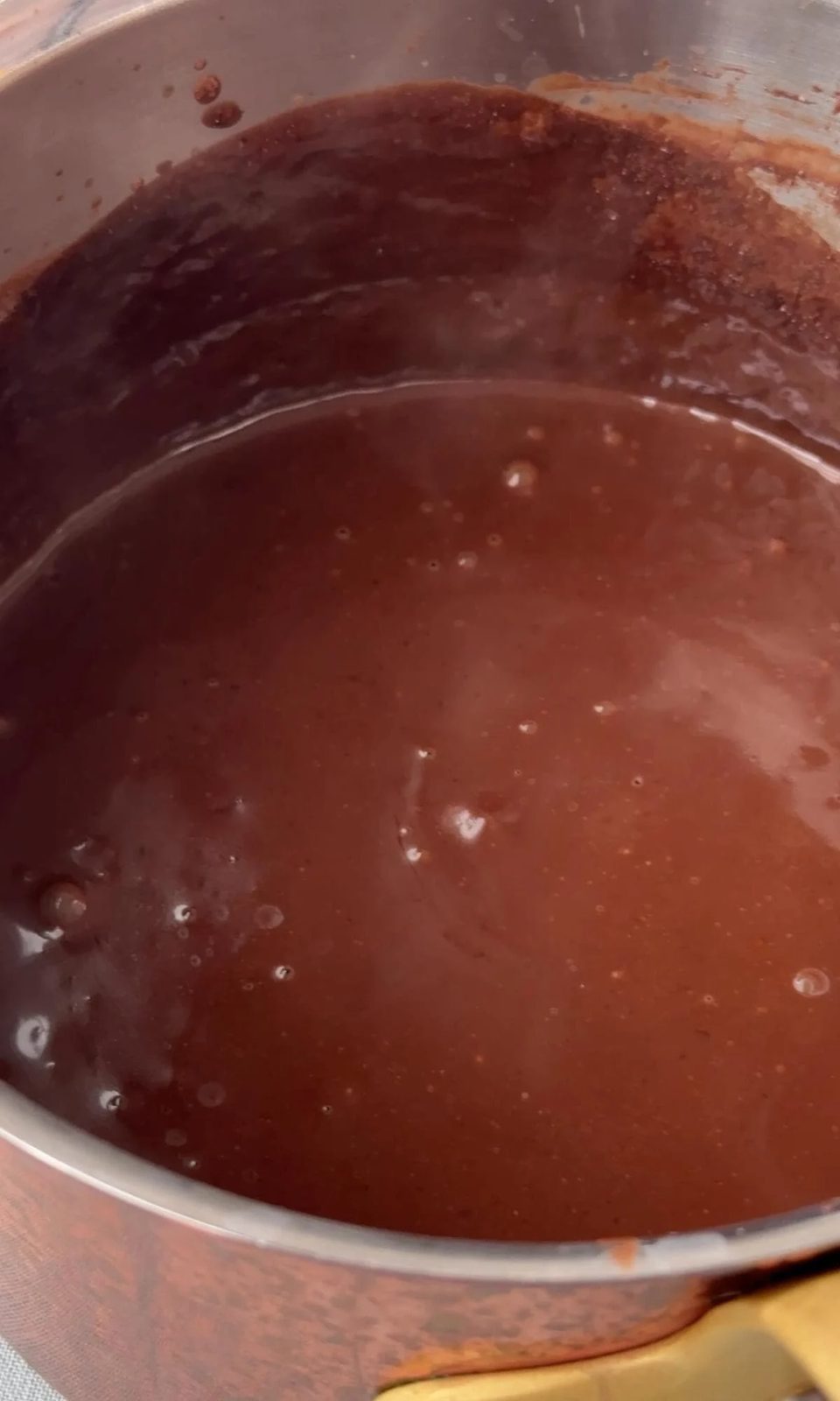Thickened French hot chocolate in a pan.