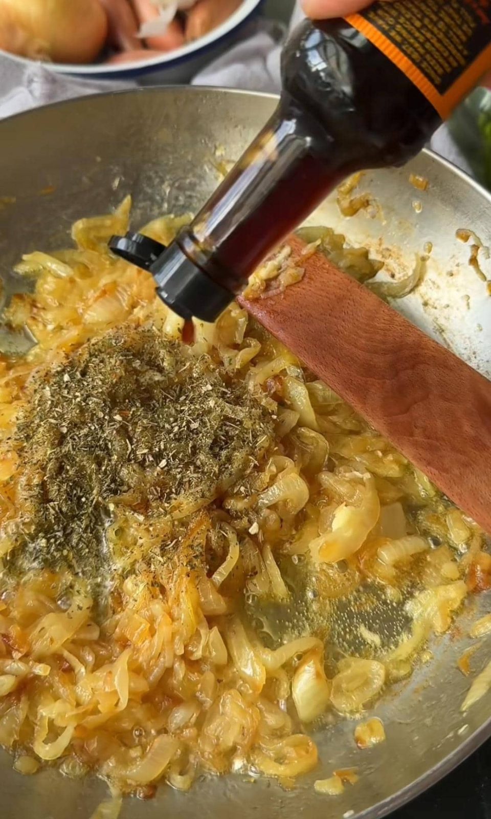 Caramelizing onions in pan with spices, wine, Worcestershire, and balsamic.