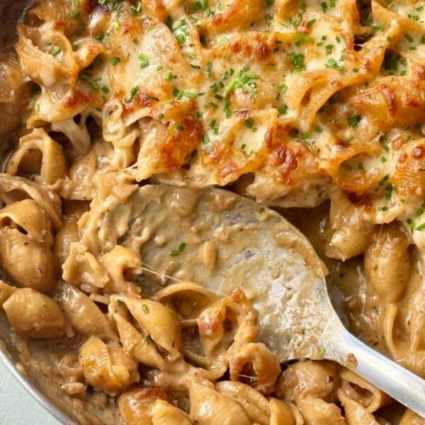 spooning french onion soup pasta.