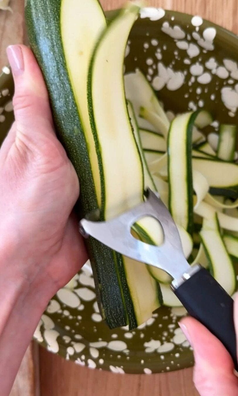 shaving courgettes.