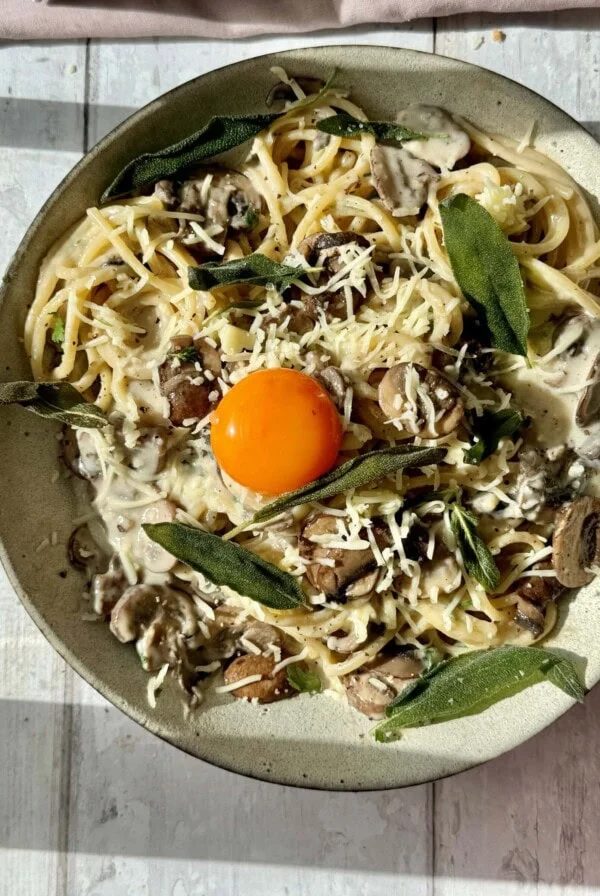 Serving Creamy Mushroom Pasta.