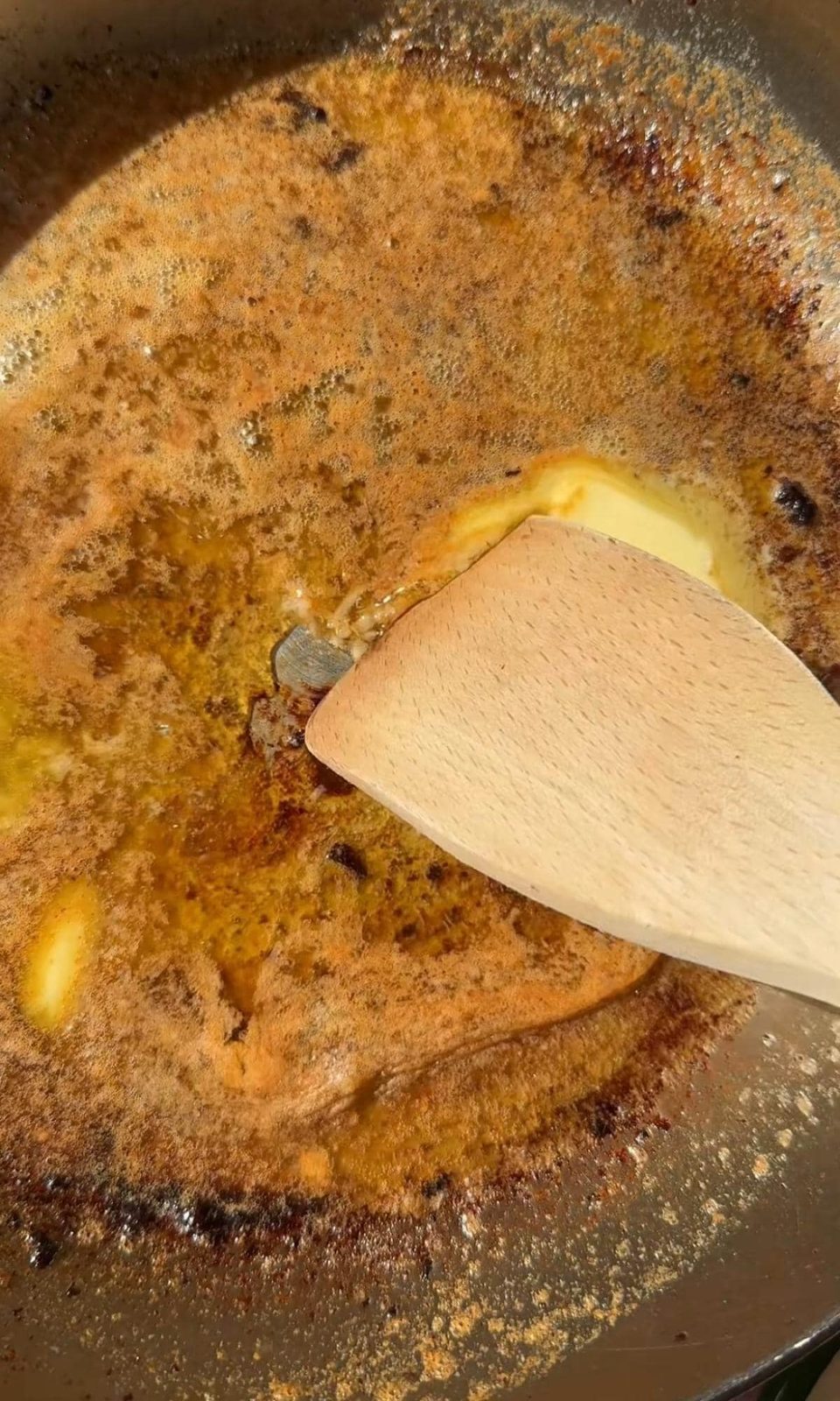 Making garlic butter in pan.