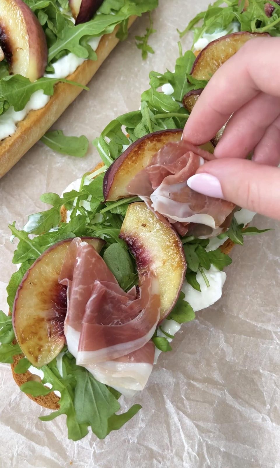 adding parma ham.