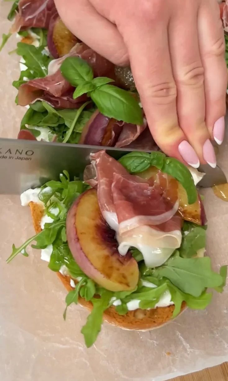 slicing peach burrata ciabatta.