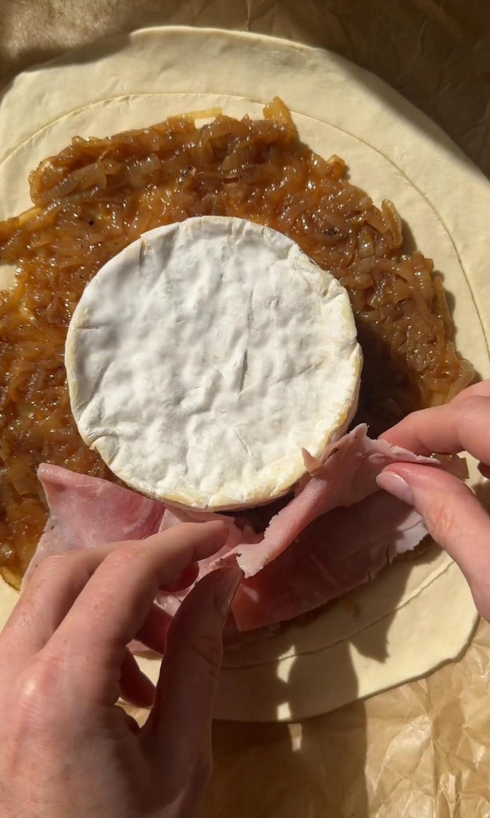 filling pithivier with ham.