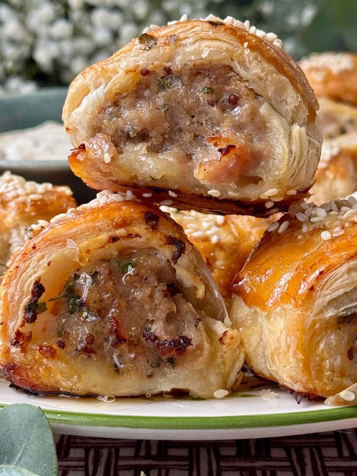 Sausage rolls on a plate.