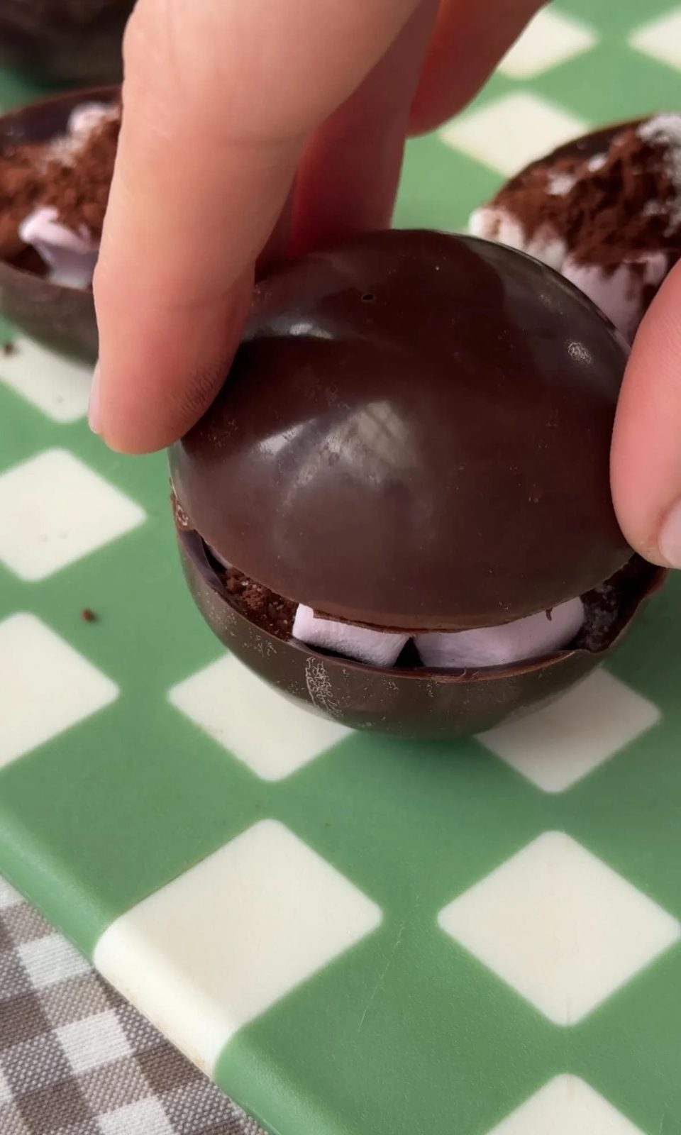 Making hot chocolate bomb.