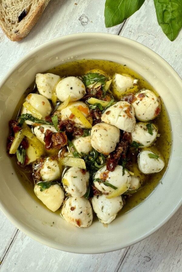 marinated mozzarella balls in a bowl
