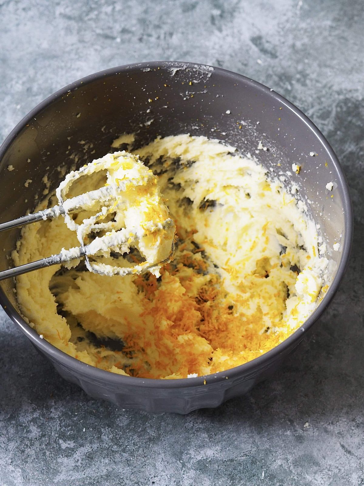 Beating cake batter with mixer.