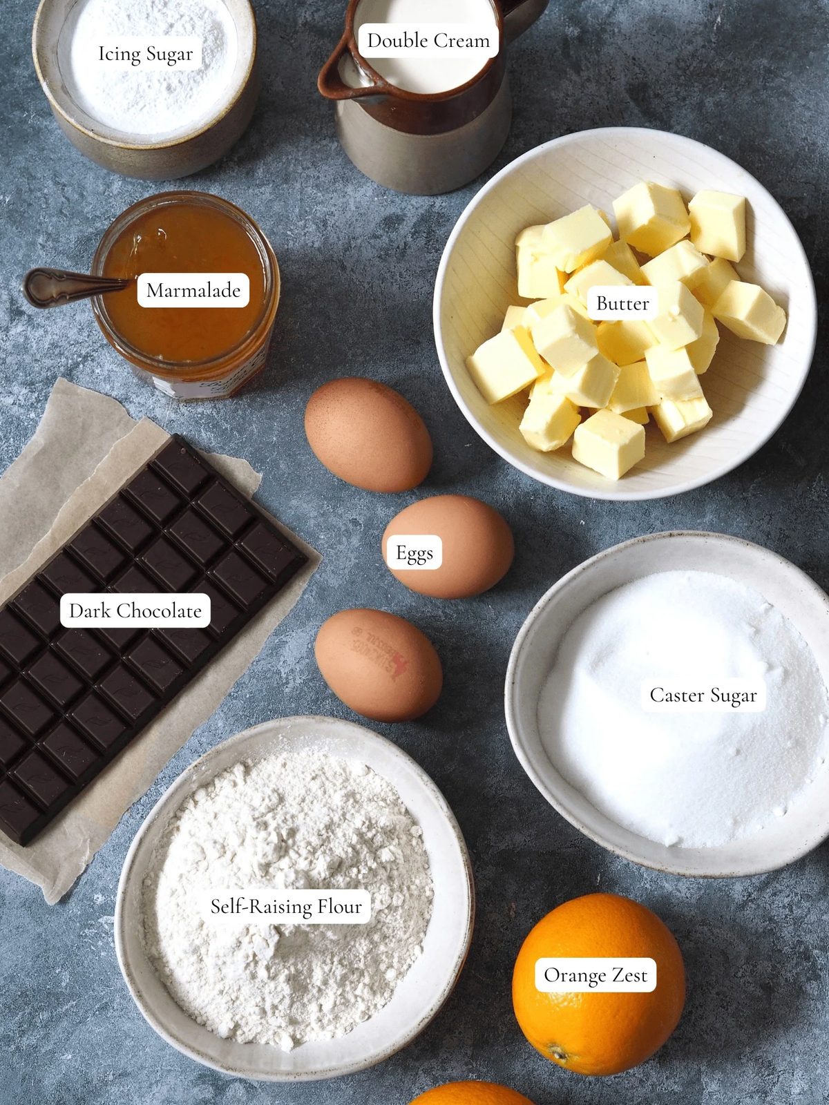 Sugars, marmalade, butter, eggs, chocolate, and other jaffa cake ingredients.