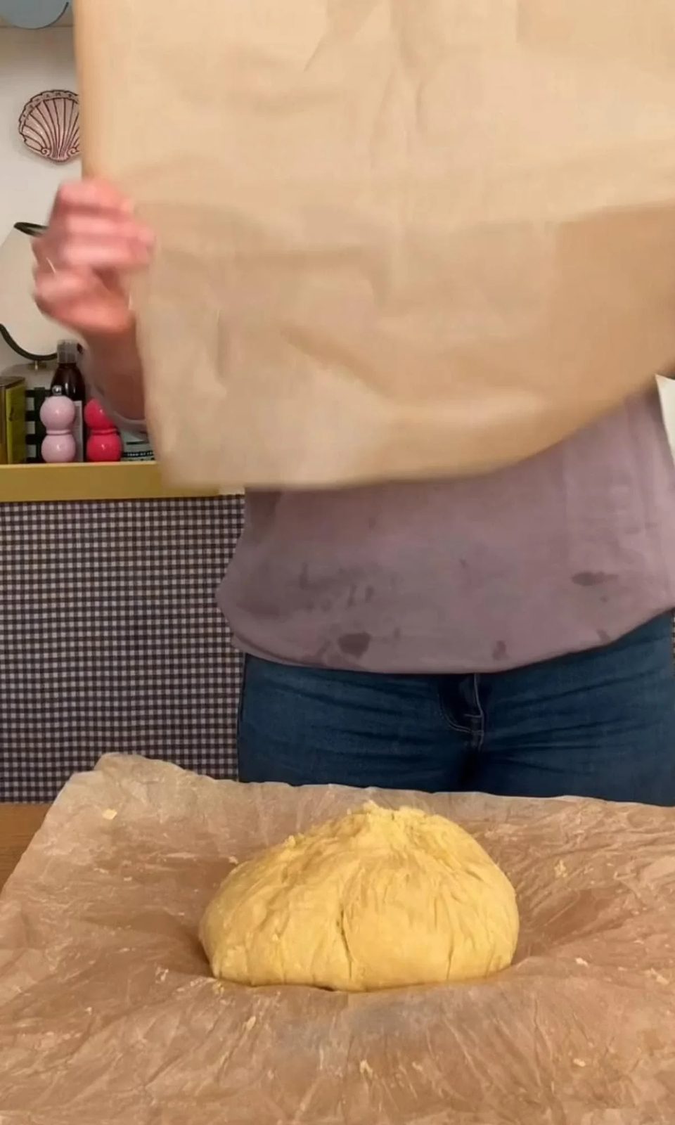 shaping shortcrust pastry into a ball.