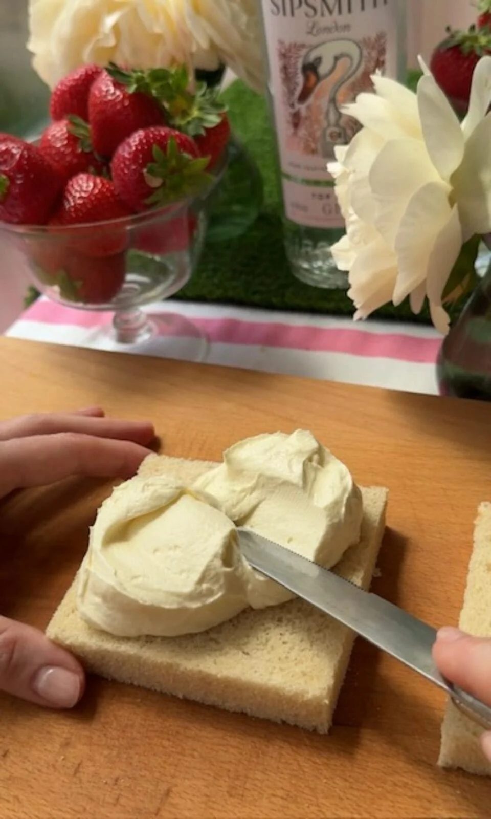 laying cream on japan strawberry sandwich.