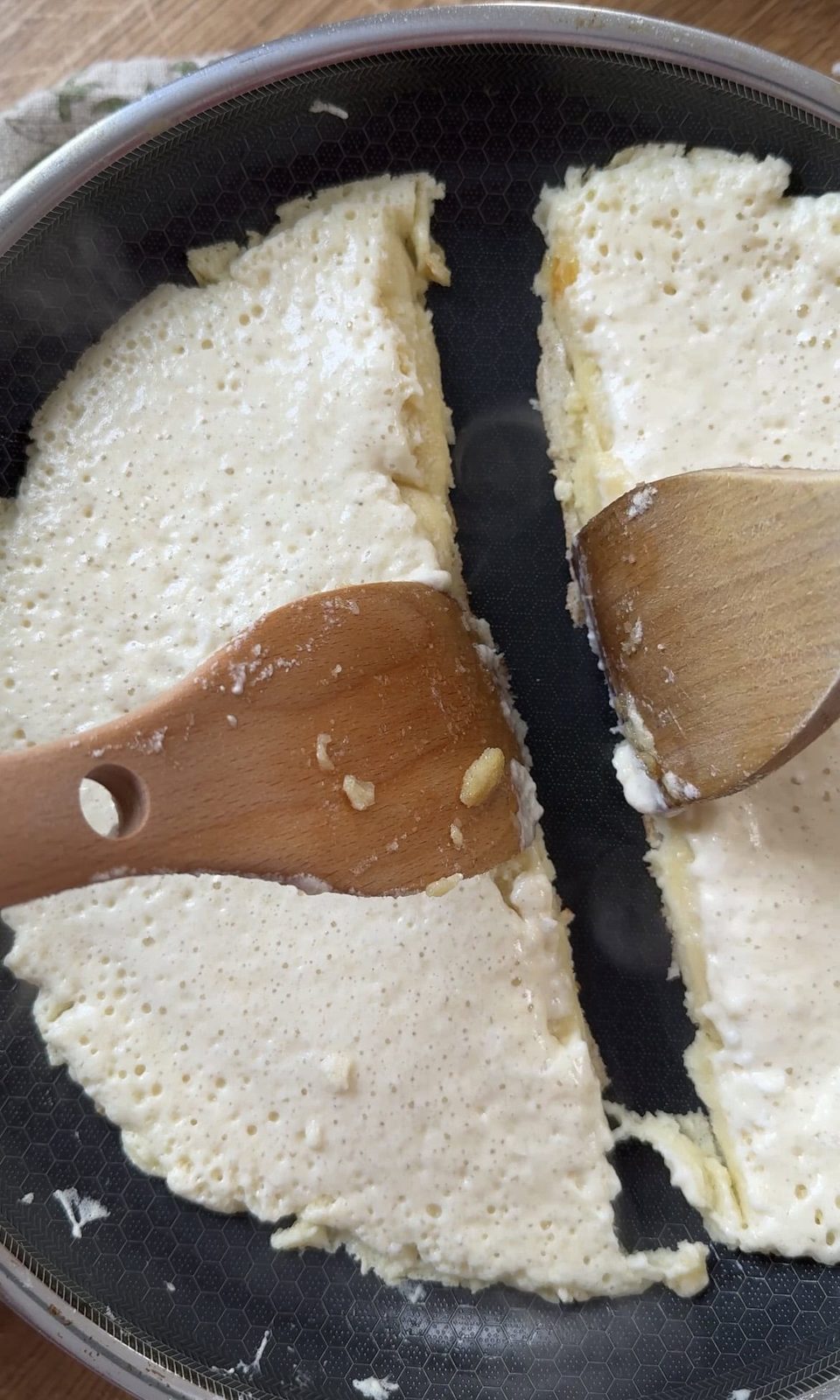 Cooking kaiserschmarrn in a pan.