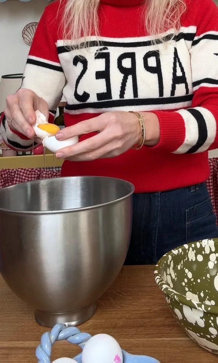 Separating eggs in bowl.