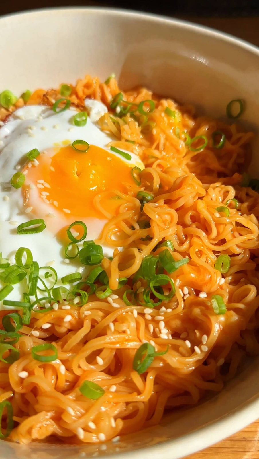 Korean Spicy Ramen Noodles with cheese and a fried egg on top