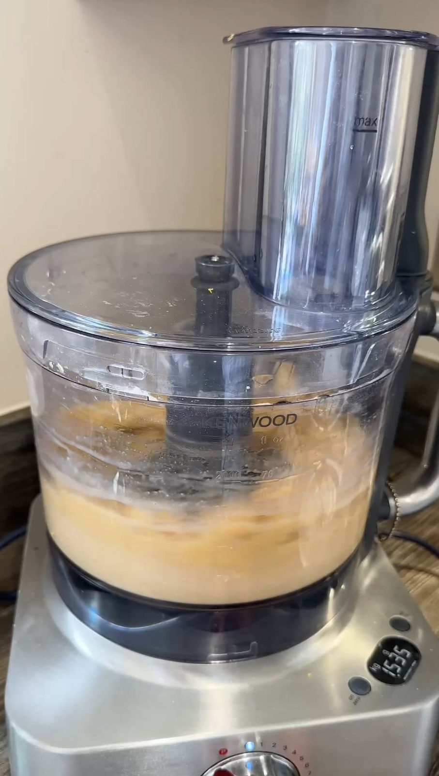 Using food processor to blend cake batter.